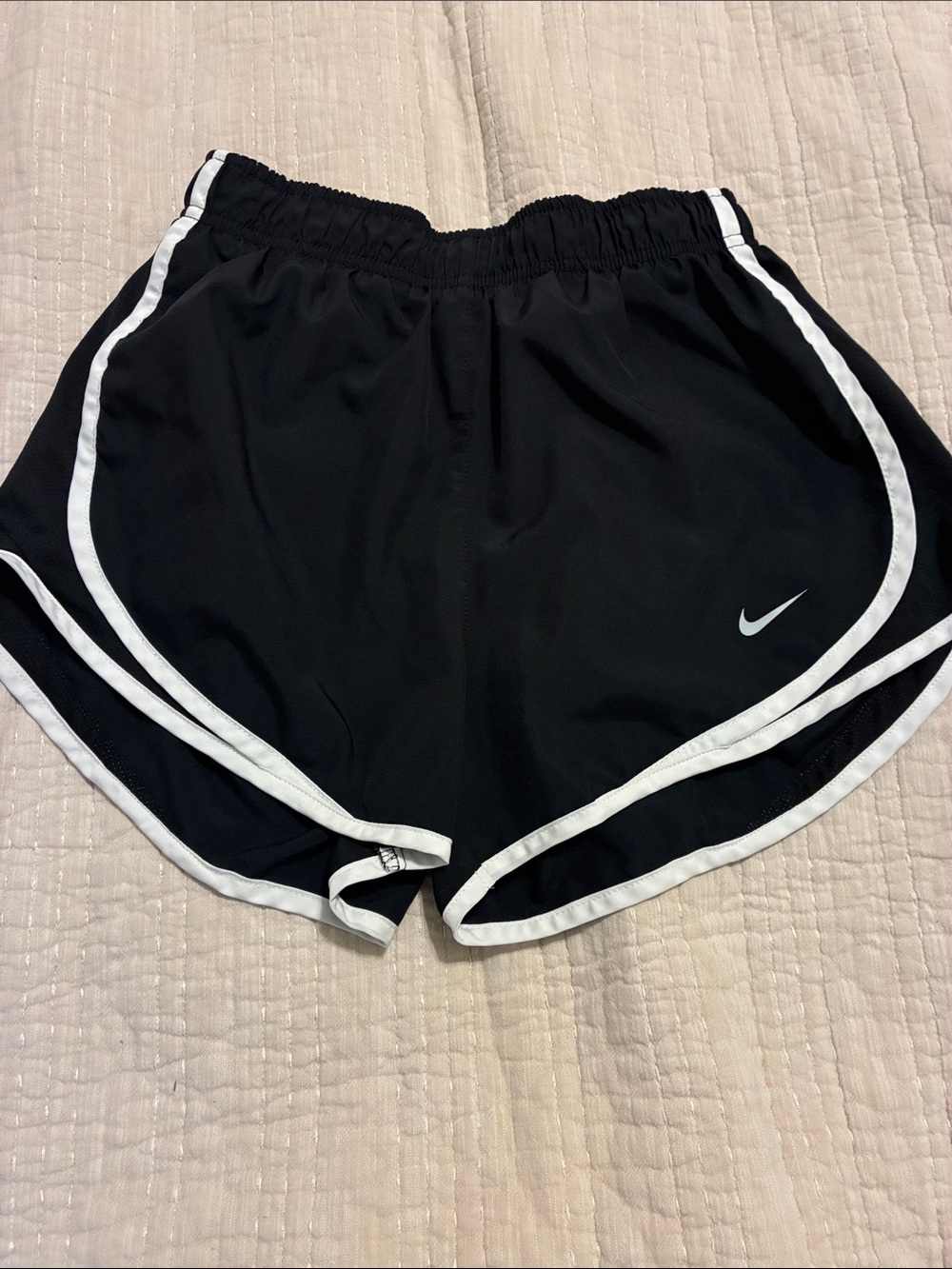Nike Black Athletic Shorts with White Trim and Swoosh